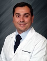 Dr. Koutouzis